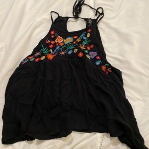 Black, flowery flow top